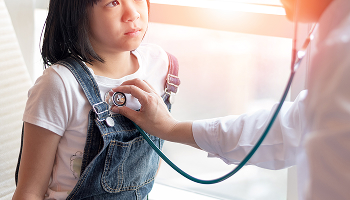 Girl being medically checked